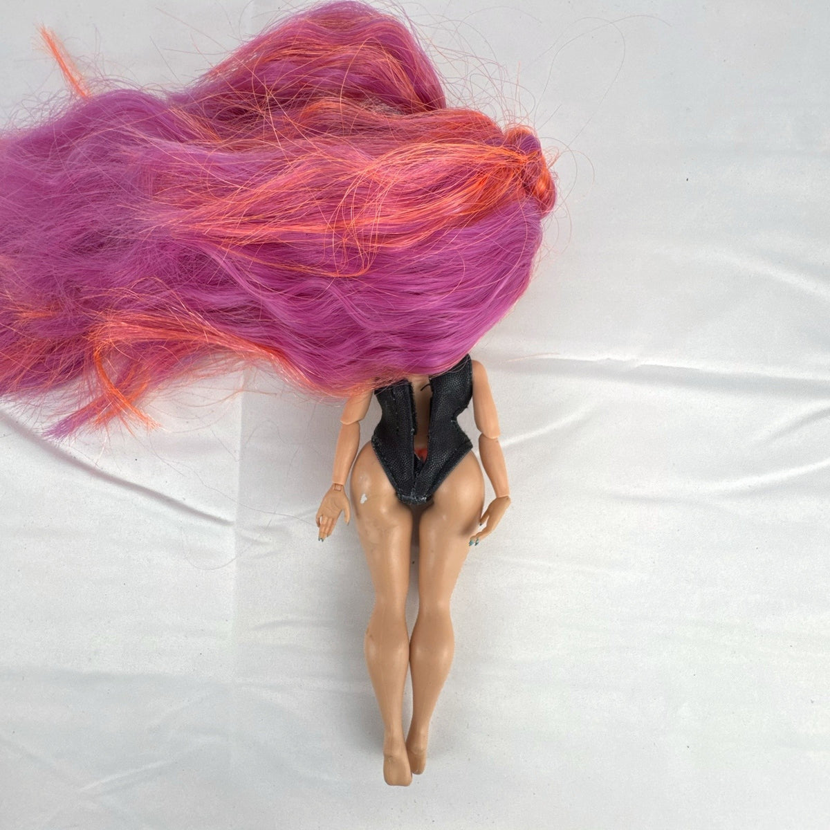 MGA L.O.L. Surprise! OMG Roller Chick fashion doll with straight pink hair and blue eyes