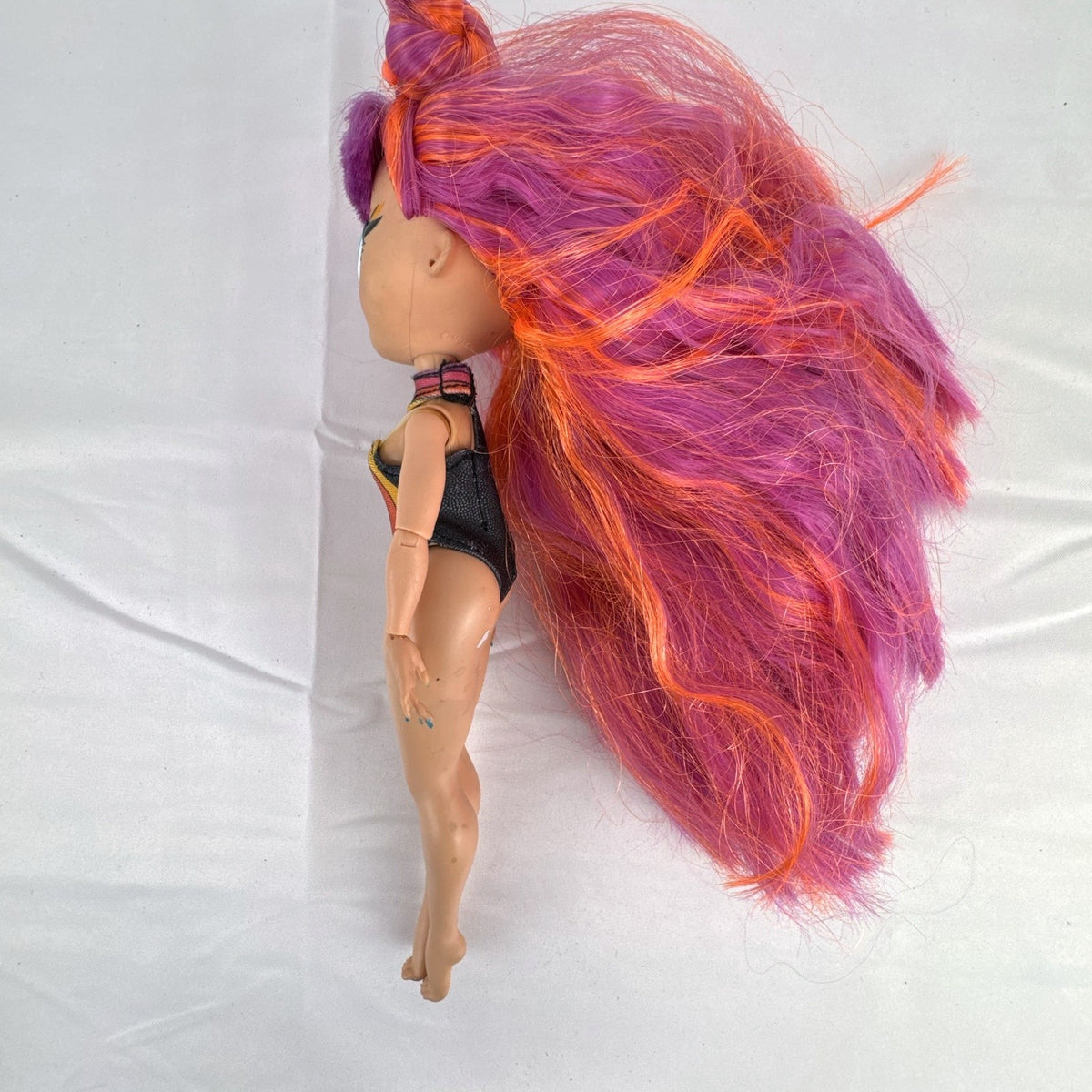 MGA L.O.L. Surprise! OMG Roller Chick fashion doll with straight pink hair and blue eyes
