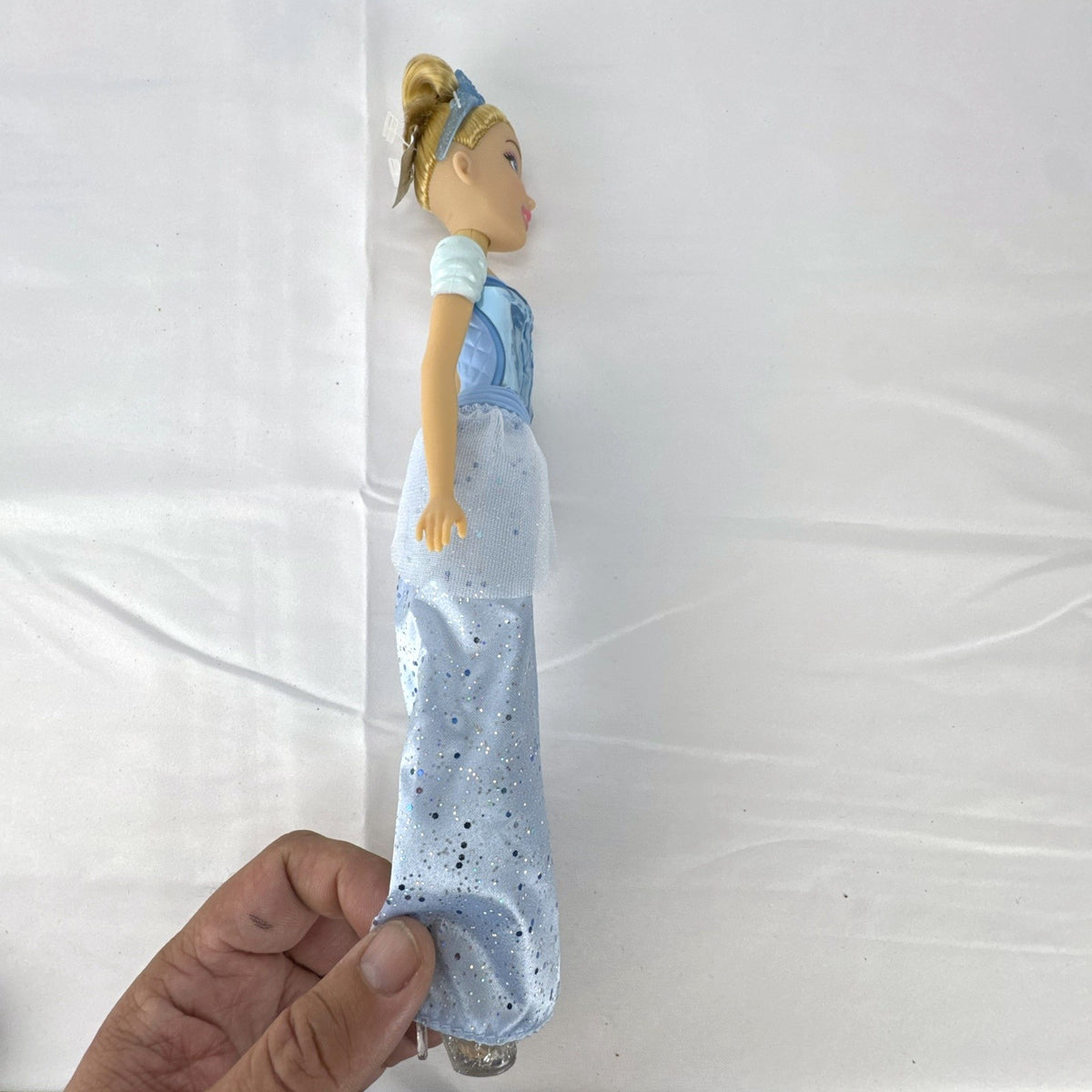 Disney Cinderella 11-inch fashion doll in molded blue bodice and glitter ballgown skirt