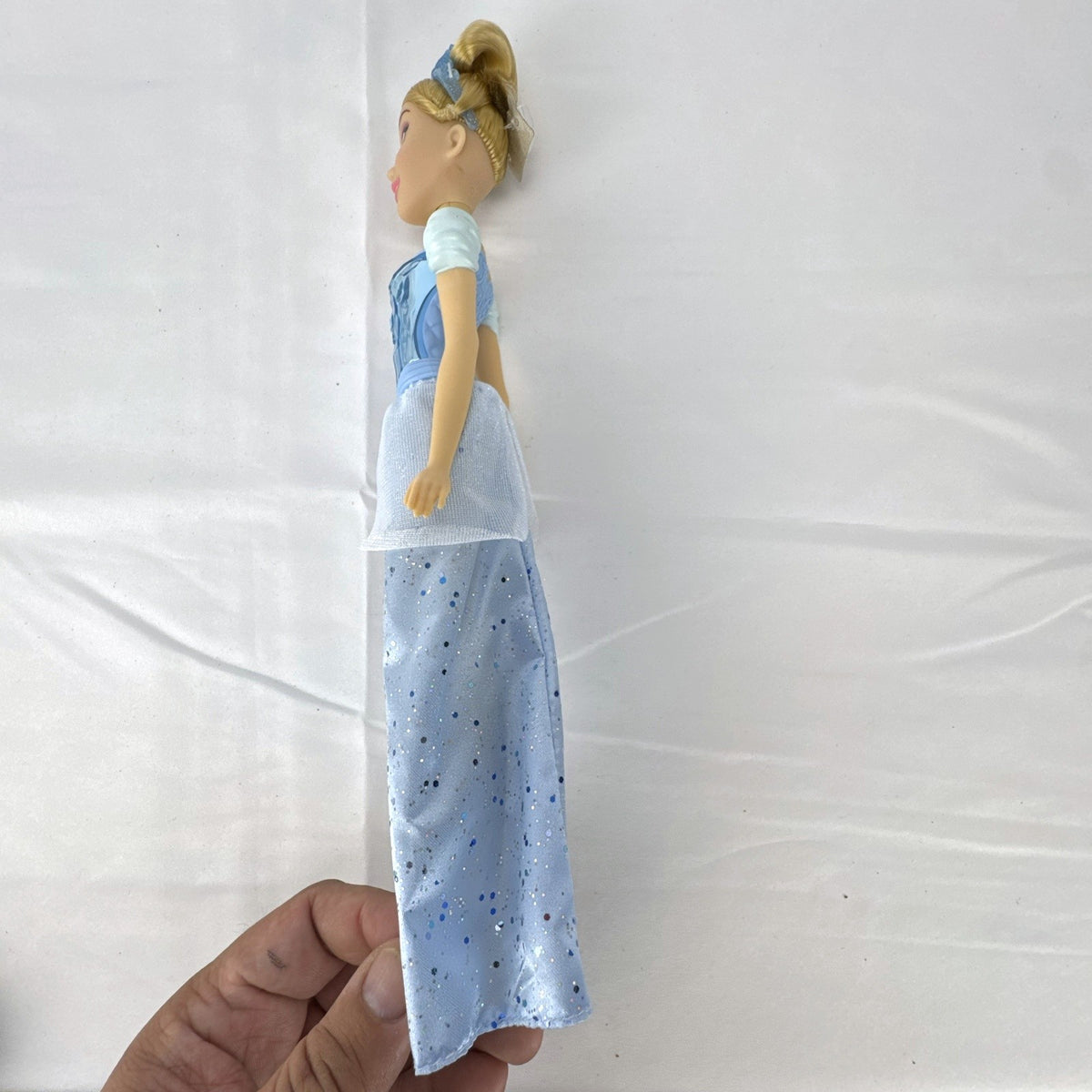 Disney Cinderella 11-inch fashion doll in molded blue bodice and glitter ballgown skirt