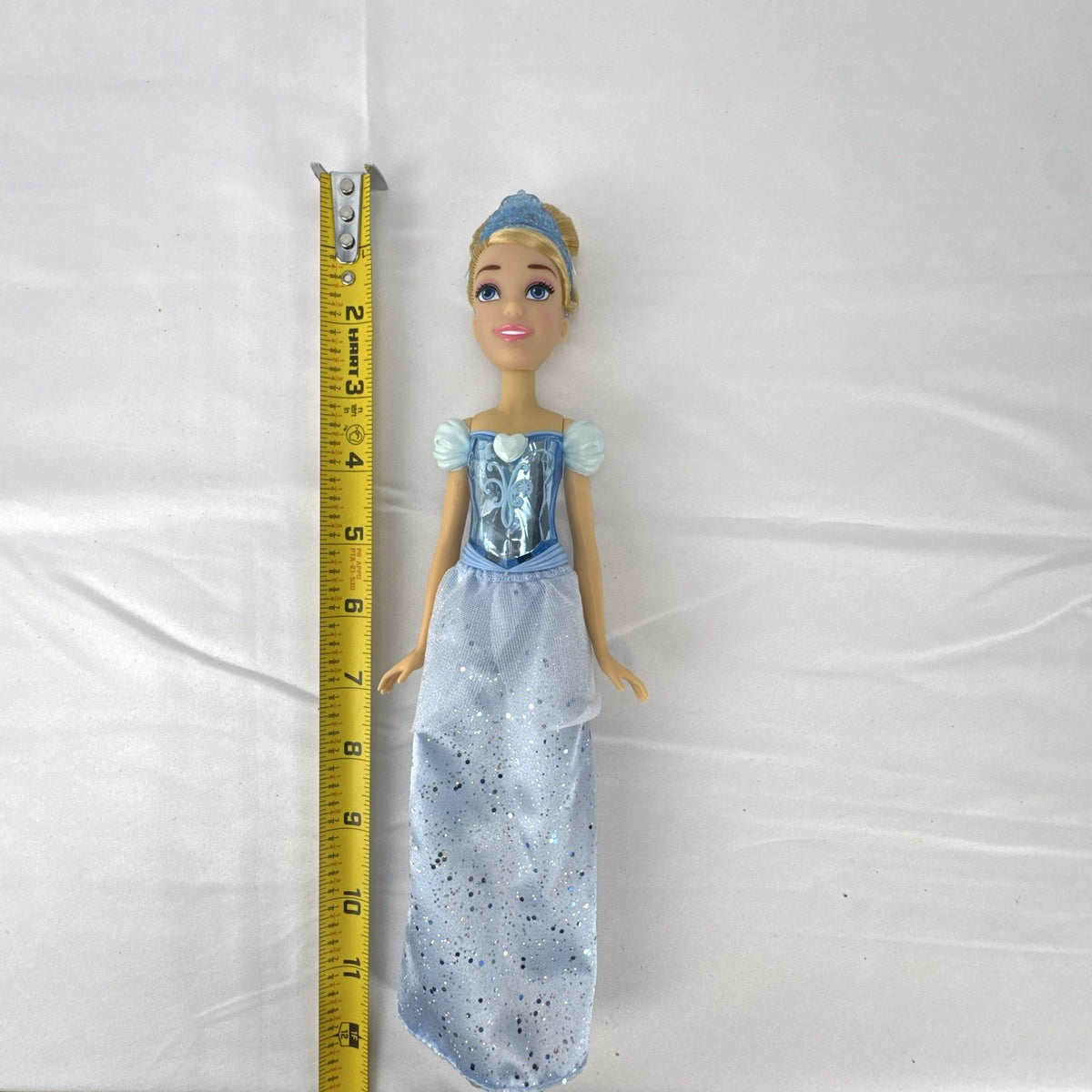 Disney Cinderella 11-inch fashion doll in molded blue bodice and glitter ballgown skirt