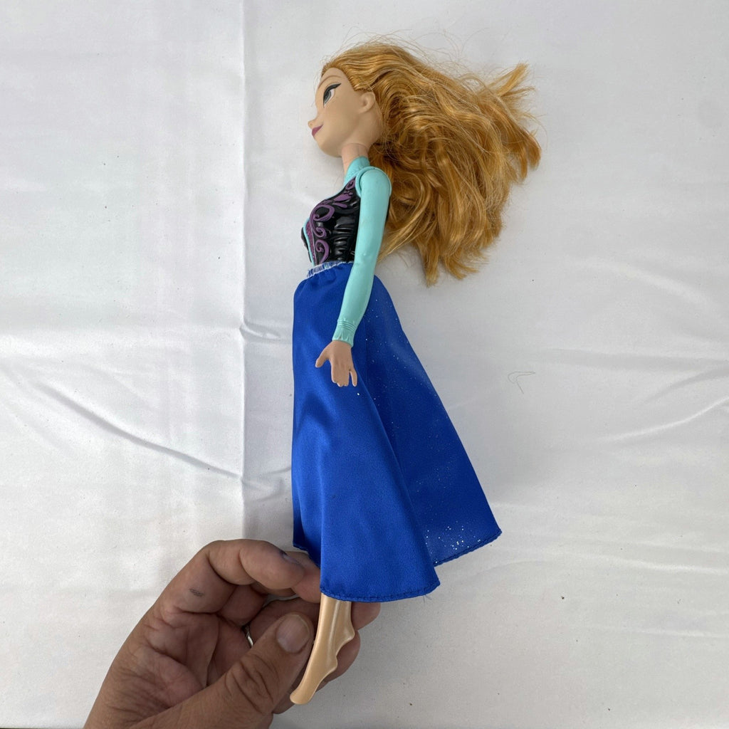 Hasbro Disney Frozen Royal Shimmer Anna 11-inch fashion doll with molded bodice and blue glitter skirt