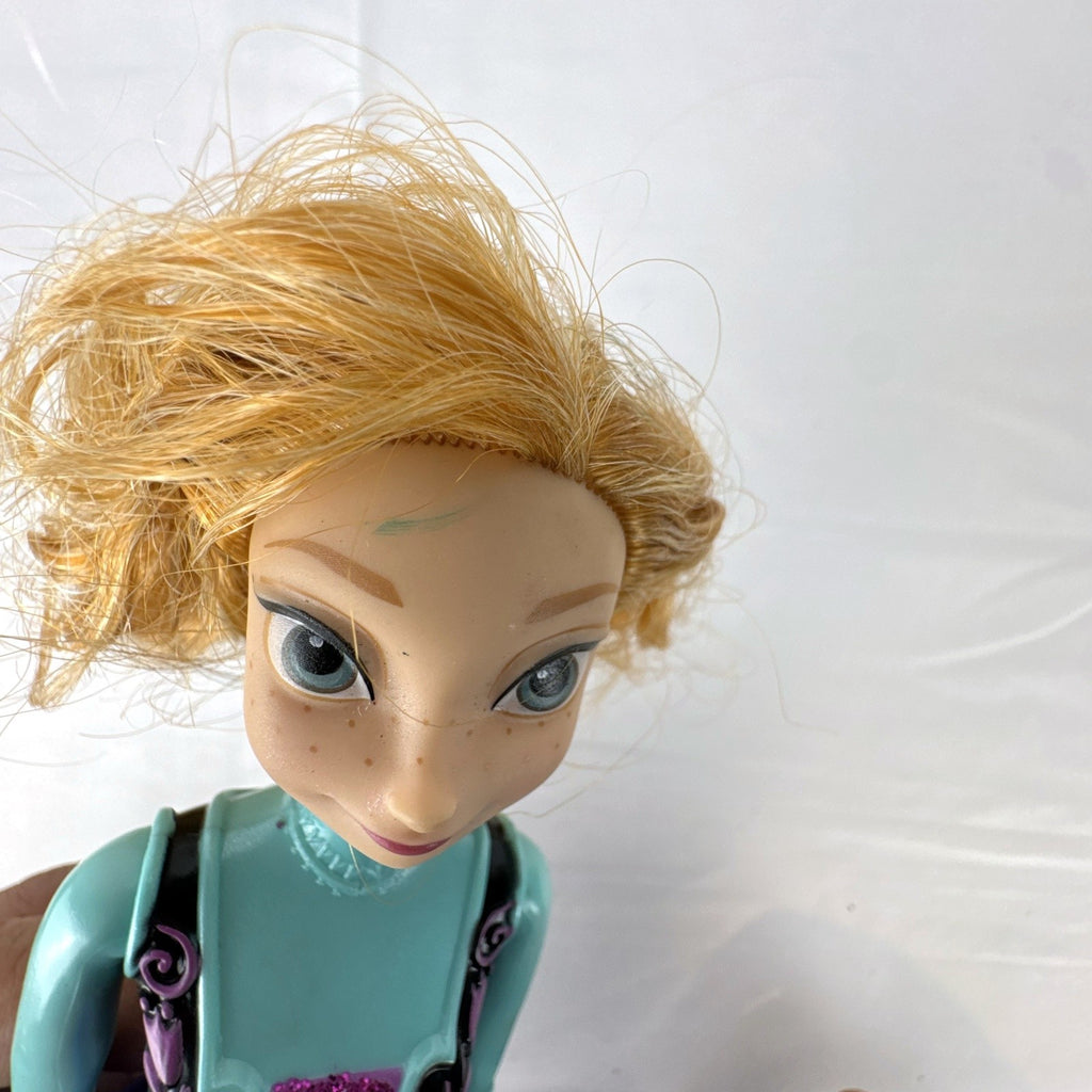 Hasbro Disney Frozen Royal Shimmer Anna 11-inch fashion doll with molded bodice and blue glitter skirt