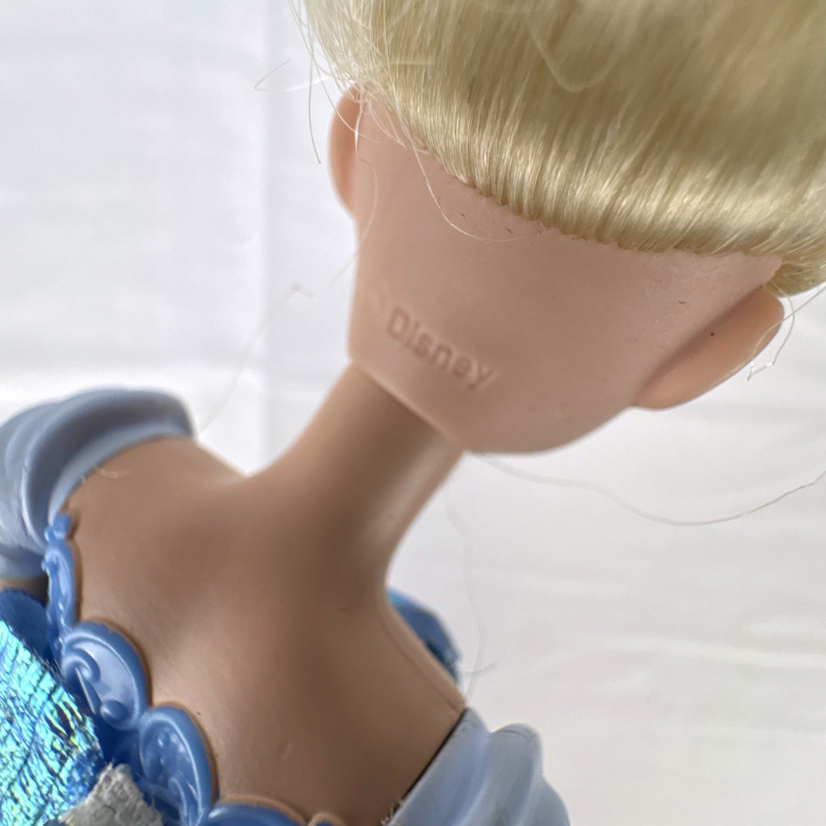 Disney Princess Cinderella 12-inch fashion doll wearing an iridescent blue ball gown and matching tiara