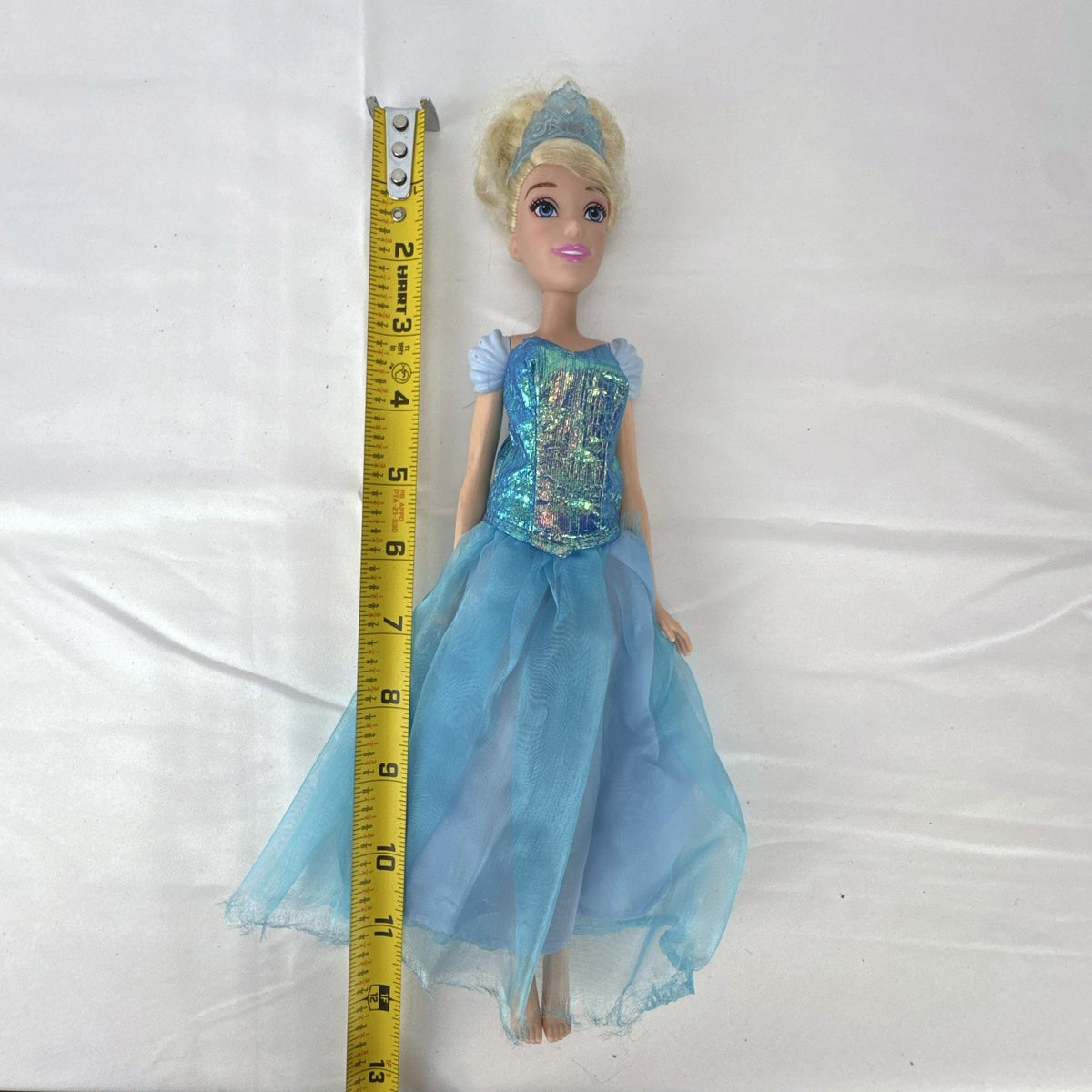 Disney Princess Cinderella 12-inch fashion doll wearing an iridescent blue ball gown and matching tiara