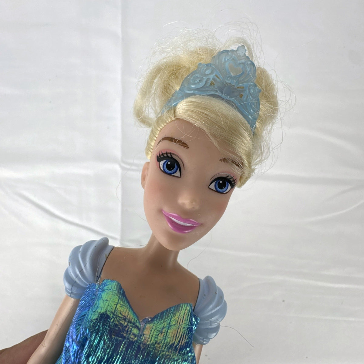 Disney Princess Cinderella 12-inch fashion doll wearing an iridescent blue ball gown and matching tiara