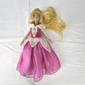 The Brass Key Disney Princess Aurora 12-inch porcelain doll wearing a pink ballgown and golden tiara