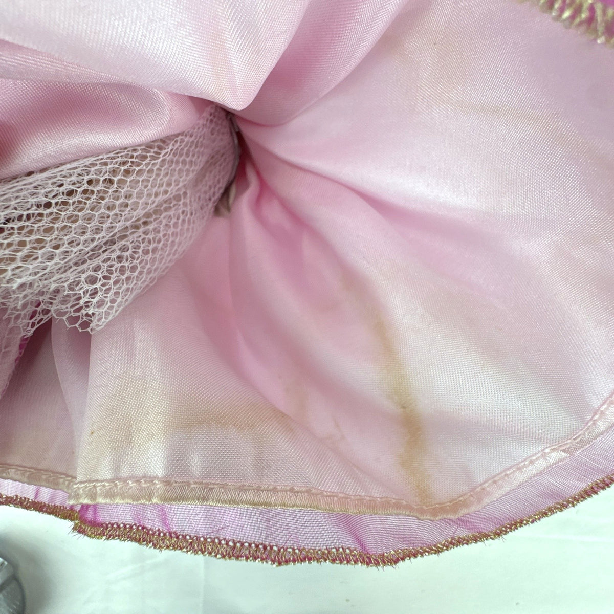 The Brass Key Disney Princess Aurora 12-inch porcelain doll wearing a pink ballgown and golden tiara