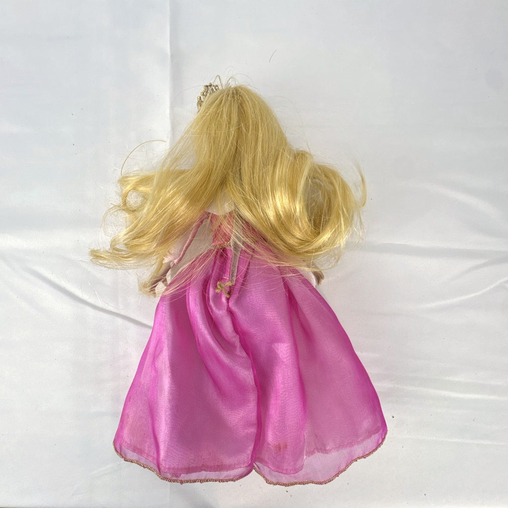 The Brass Key Disney Princess Aurora 12-inch porcelain doll wearing a pink ballgown and golden tiara