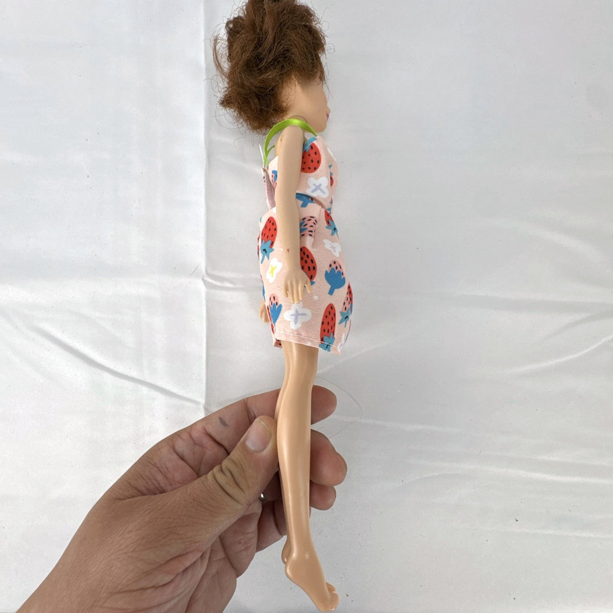 Hasbro Disney Princess Belle 11-inch fashion doll wearing a strawberry print dress