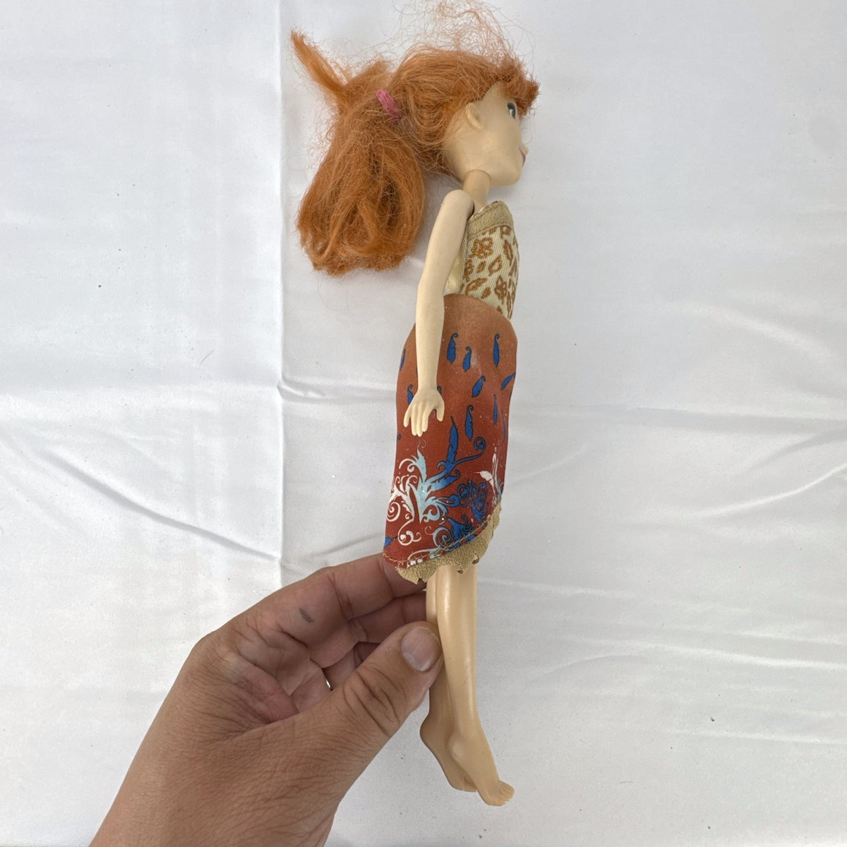 Hasbro Disney Frozen 11-inch Princess Anna fashion doll with red hair in patterned dress