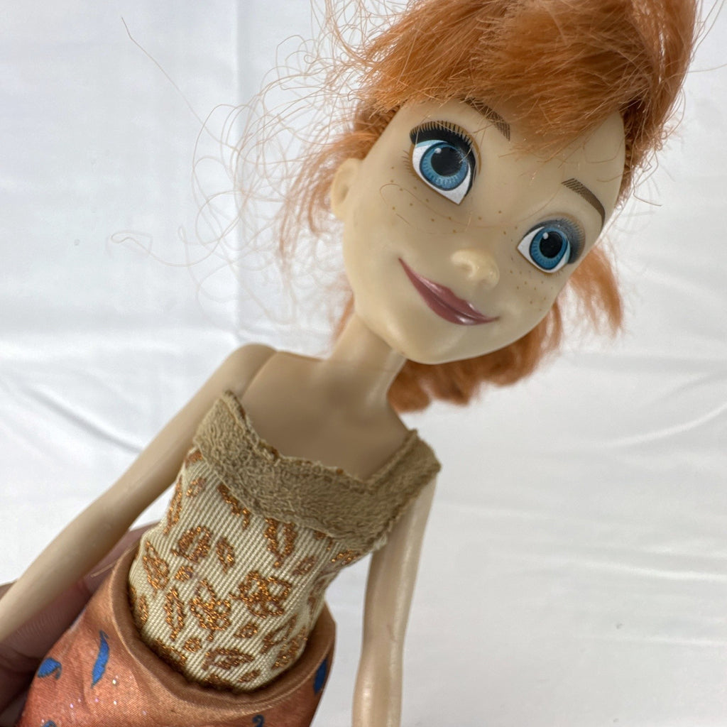 Hasbro Disney Frozen 11-inch Princess Anna fashion doll with red hair in patterned dress