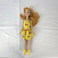 Mattel Disney Frozen Princess Anna 11-inch fashion doll wearing yellow strawberry dress and ankle booties