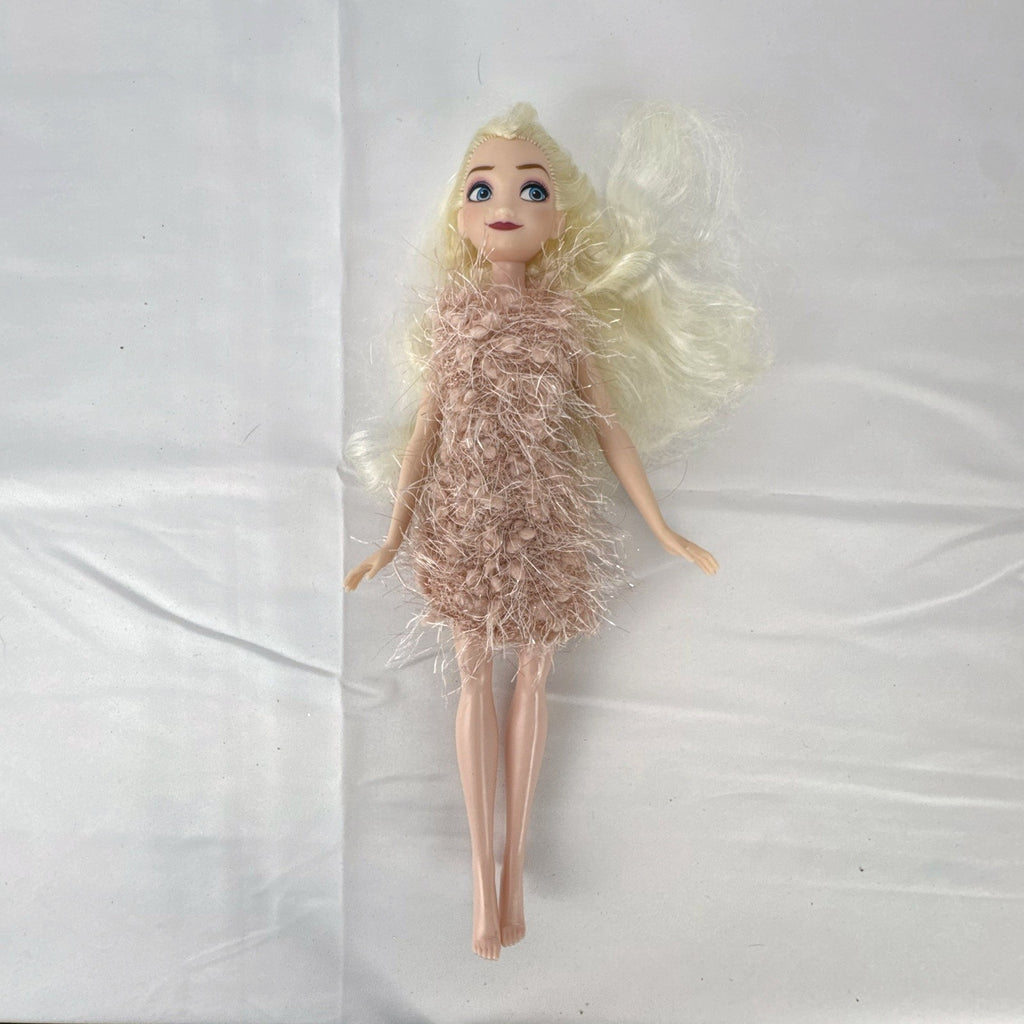 Disney Frozen Elsa 11-inch fashion doll wearing a fuzzy pink knit dress