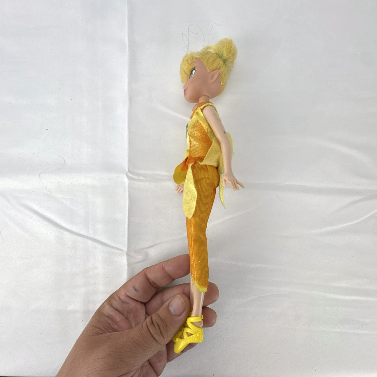 JAKKS Pacific Disney Fairies Tinker Bell 9-inch doll in yellow leaf tunic and orange capri pants