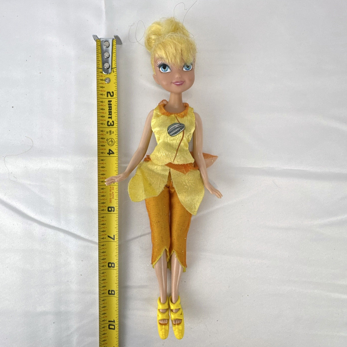 JAKKS Pacific Disney Fairies Tinker Bell 9-inch doll in yellow leaf tunic and orange capri pants