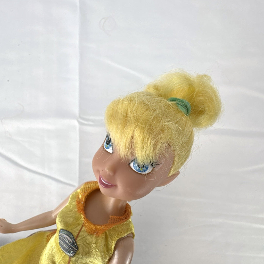 JAKKS Pacific Disney Fairies Tinker Bell 9-inch doll in yellow leaf tunic and orange capri pants