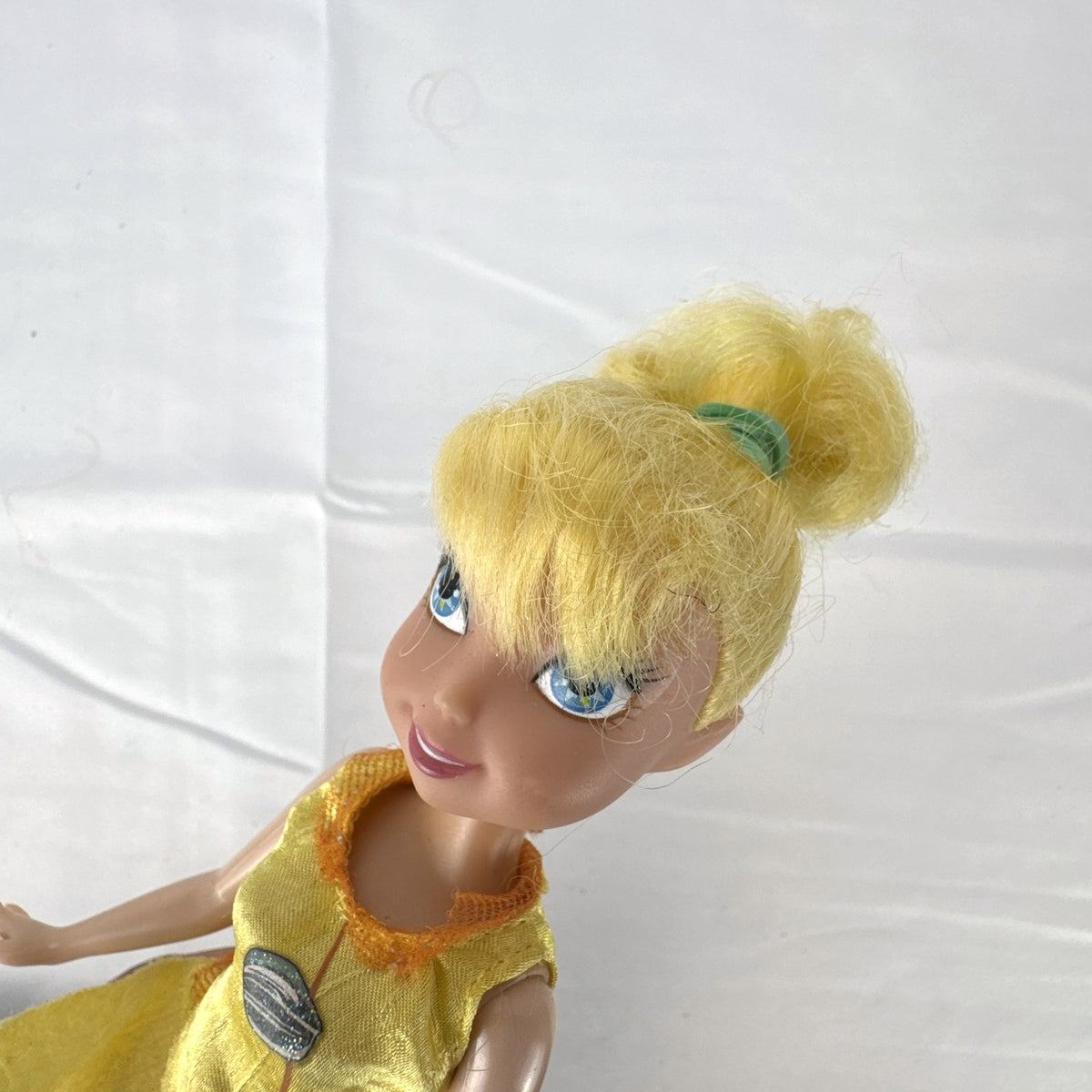 JAKKS Pacific Disney Fairies Tinker Bell 9-inch doll in yellow leaf tunic and orange capri pants