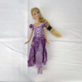 Mattel Disney Princess Rapunzel 11-inch doll wearing purple floral dress and shoes with braided blonde hair