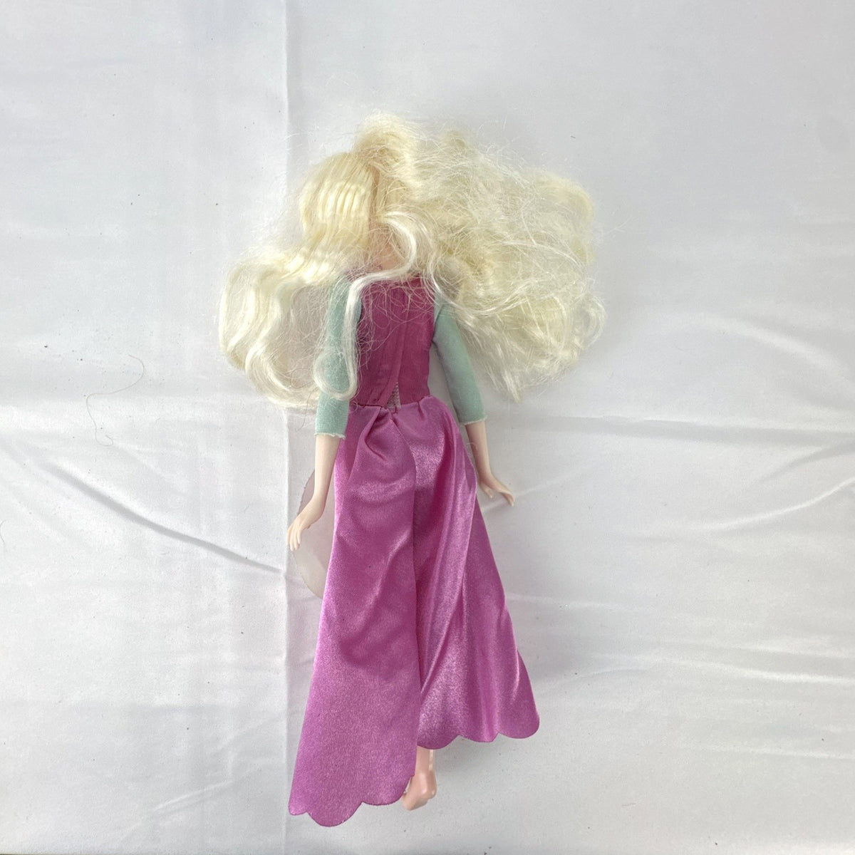 Disney Frozen 11-inch Elsa fashion doll wearing pink peasant dress with shimmering apron