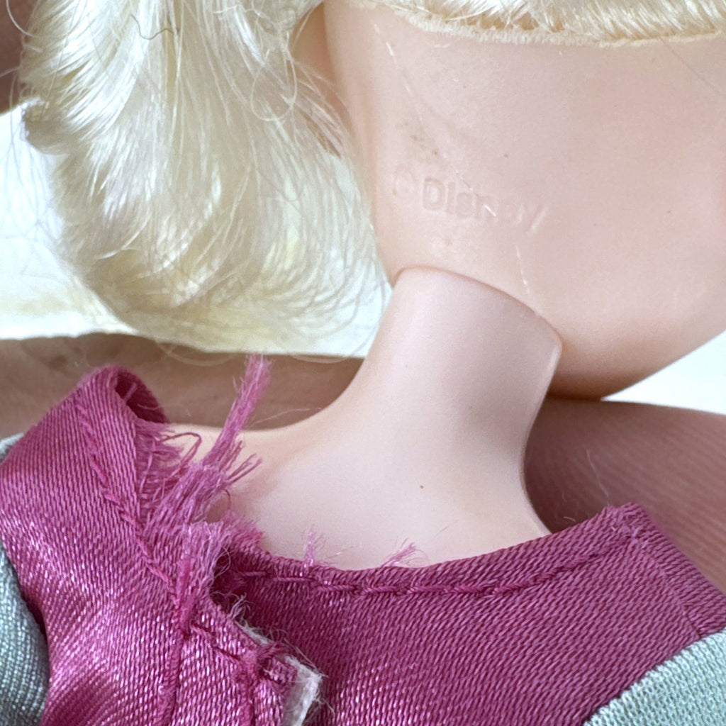 Disney Frozen 11-inch Elsa fashion doll wearing pink peasant dress with shimmering apron