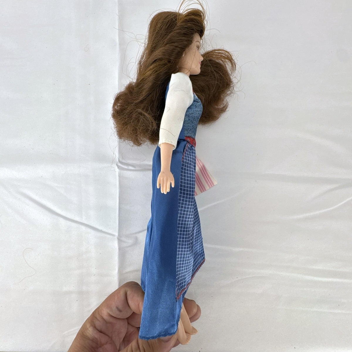 Hasbro Disney live-action Belle 11-inch fashion doll with Emma Watson likeness in blue village dress