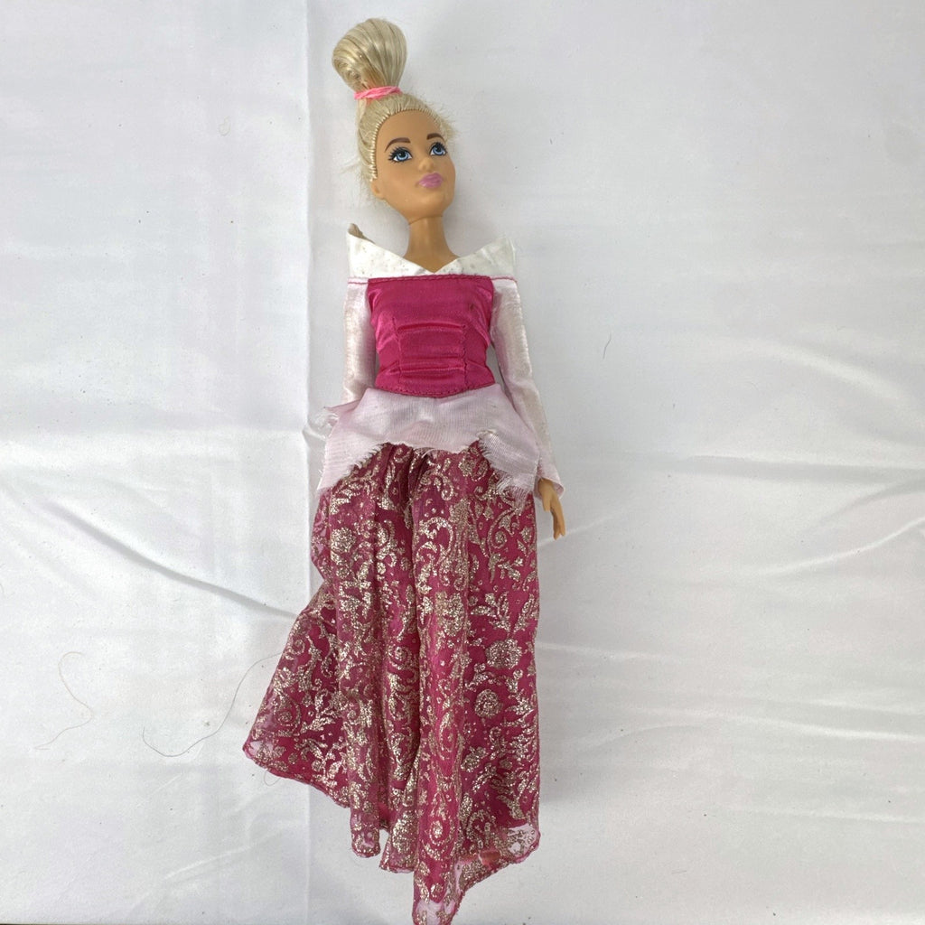 12-inch Mattel Barbie fashion doll wearing a pink Disney Princess Aurora Sleeping Beauty dress with blonde hair in a topknot