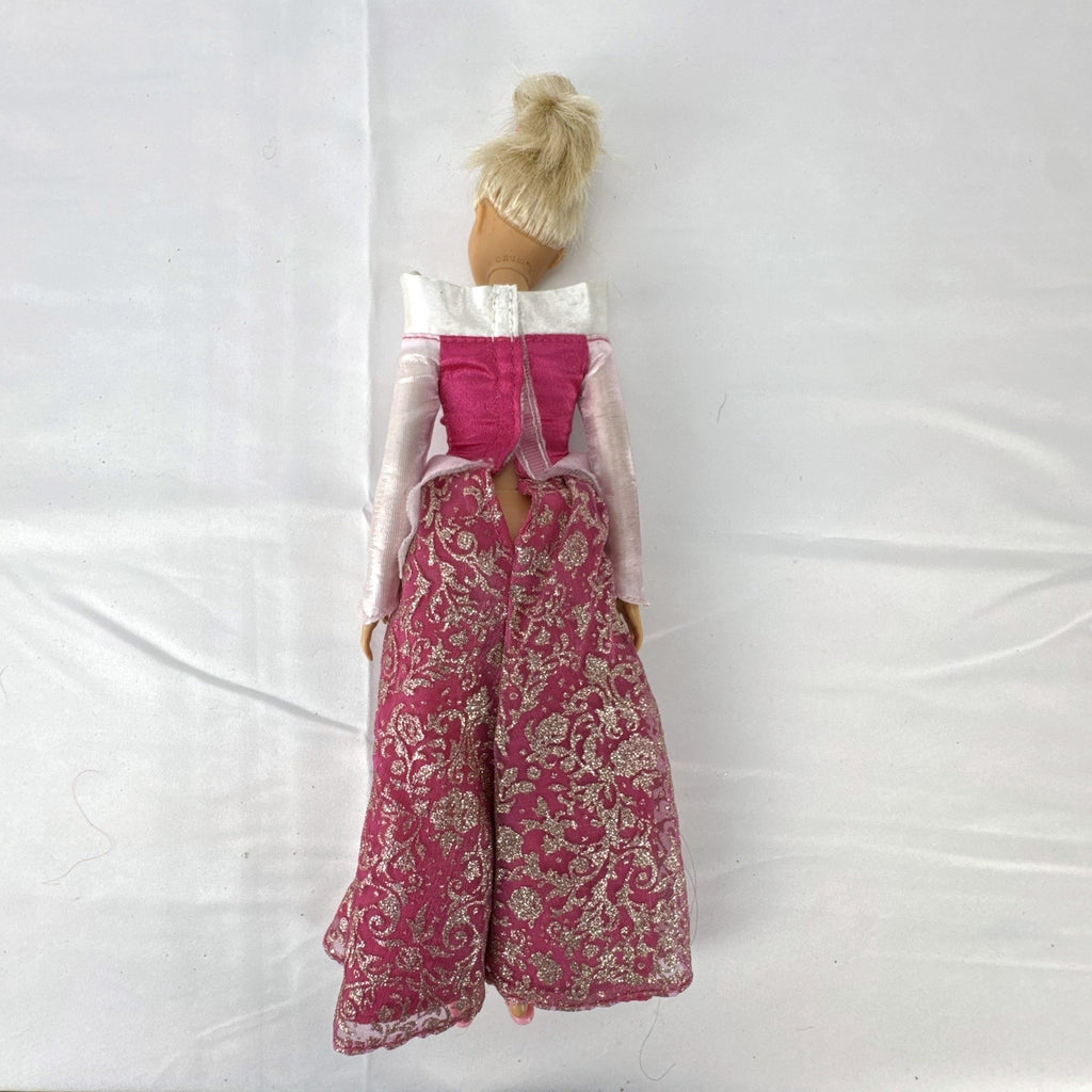 12-inch Mattel Barbie fashion doll wearing a pink Disney Princess Aurora Sleeping Beauty dress with blonde hair in a topknot