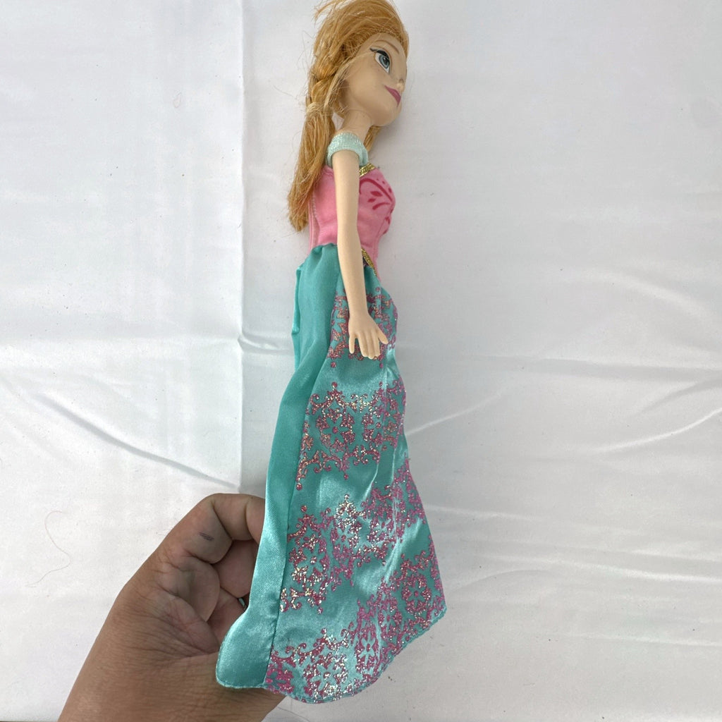 Mattel Disney Frozen 11-inch Princess Anna doll in pink and teal glitter dress with braided hair