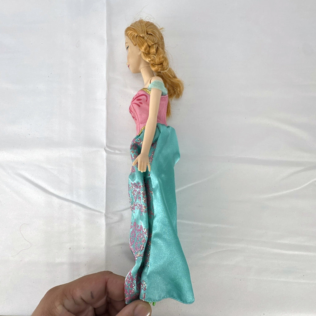 Mattel Disney Frozen 11-inch Princess Anna doll in pink and teal glitter dress with braided hair