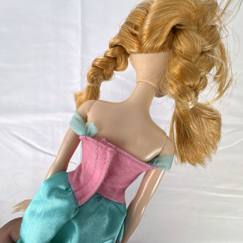 Mattel Disney Frozen 11-inch Princess Anna doll in pink and teal glitter dress with braided hair