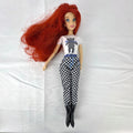 Articulated 11-inch Disney Ariel fashion doll with red hair in casual checkered pants and graphic t-shirt