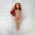 Mattel 2005 Disney Princess Ariel 11-inch fashion doll in peach floral dress with pink heels