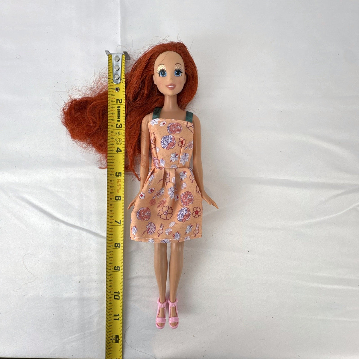 Mattel 2005 Disney Princess Ariel 11-inch fashion doll in peach floral dress with pink heels