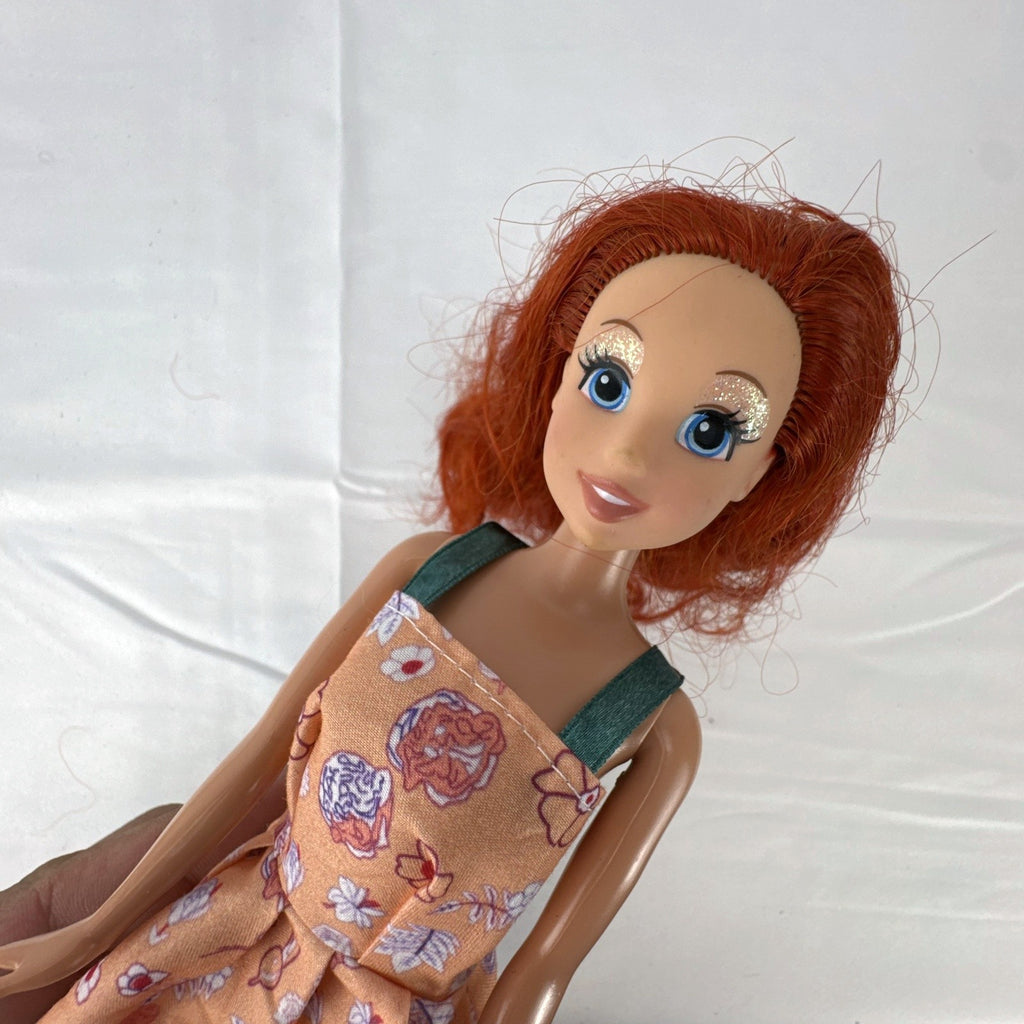 Mattel 2005 Disney Princess Ariel 11-inch fashion doll in peach floral dress with pink heels