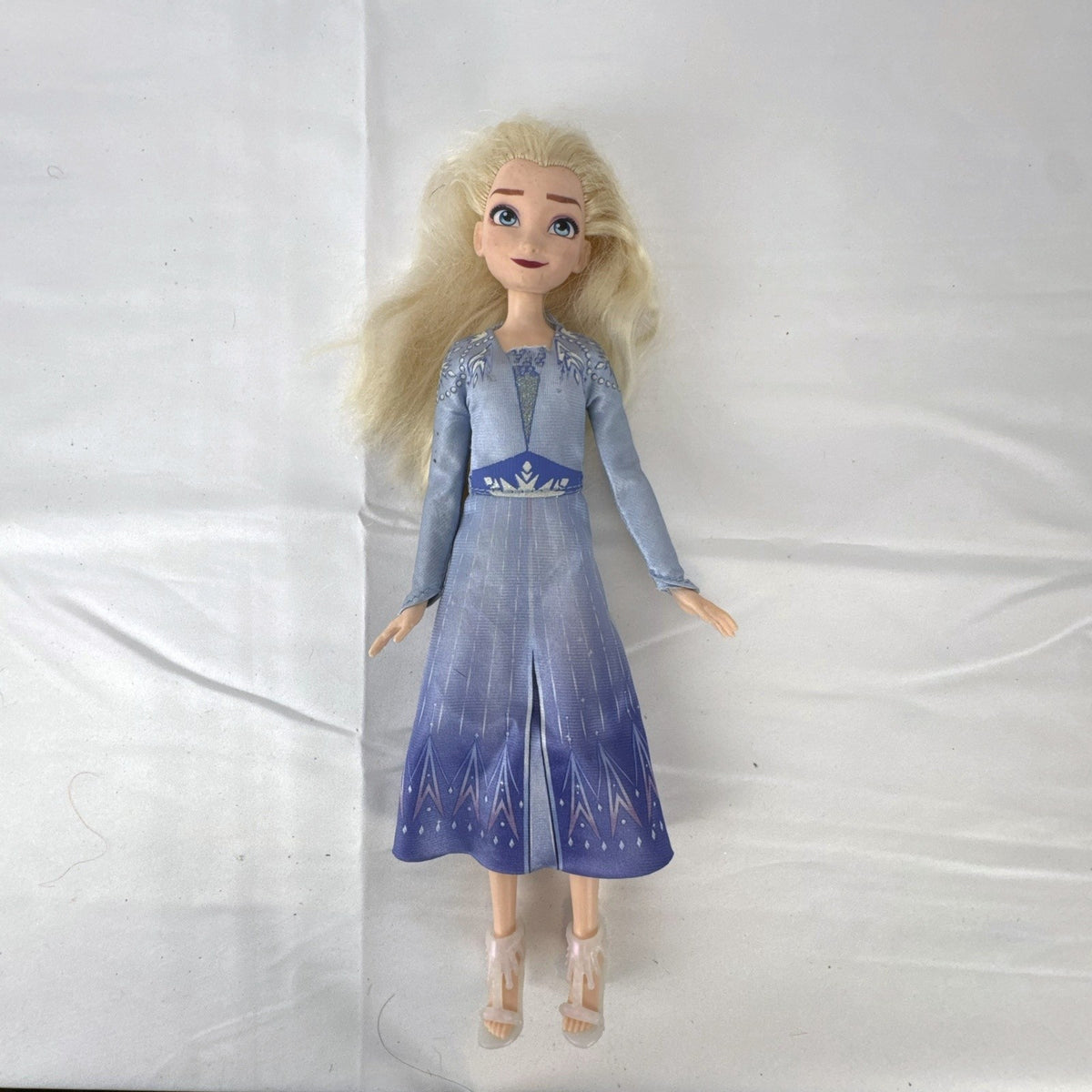 Hasbro Disney Frozen 2 Elsa 11-inch fashion doll wearing blue patterned travel dress and boots