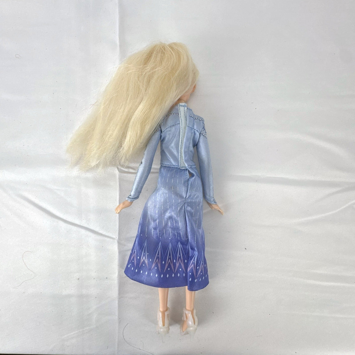 Hasbro Disney Frozen 2 Elsa 11-inch fashion doll wearing blue patterned travel dress and boots