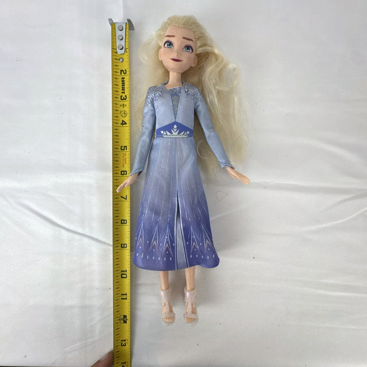 Hasbro Disney Frozen 2 Elsa 11-inch fashion doll wearing blue patterned travel dress and boots