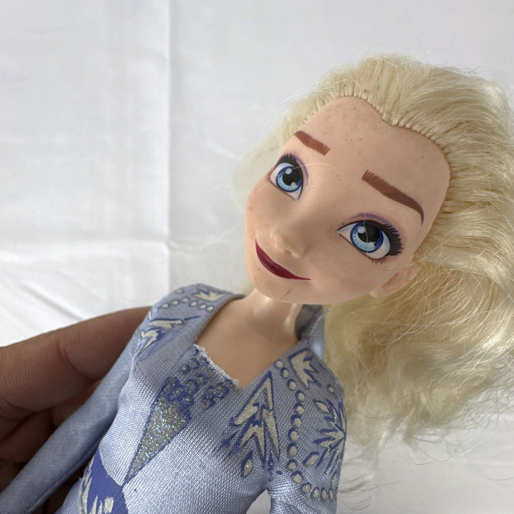 Hasbro Disney Frozen 2 Elsa 11-inch fashion doll wearing blue patterned travel dress and boots