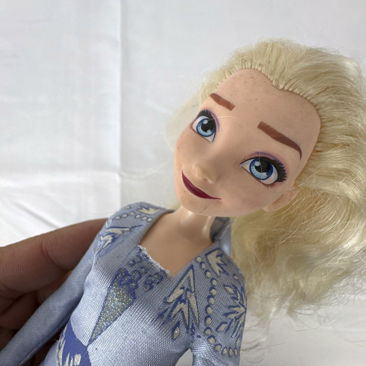 Hasbro Disney Frozen 2 Elsa 11-inch fashion doll wearing blue patterned travel dress and boots