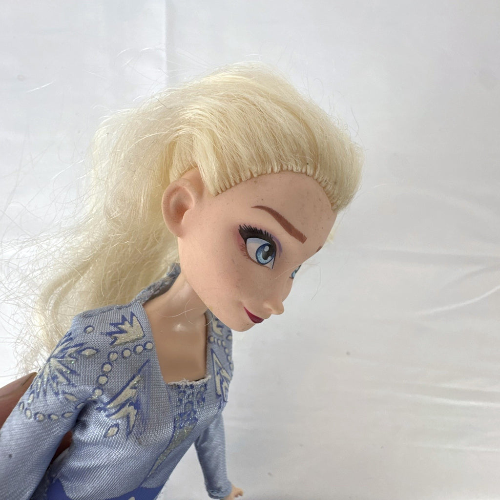 Hasbro Disney Frozen 2 Elsa 11-inch fashion doll wearing blue patterned travel dress and boots