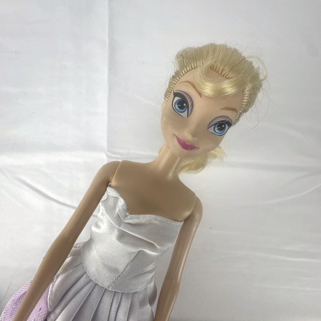 Mattel Disney Frozen Elsa 11-inch fashion doll with blonde braid in purple floral dress and heels