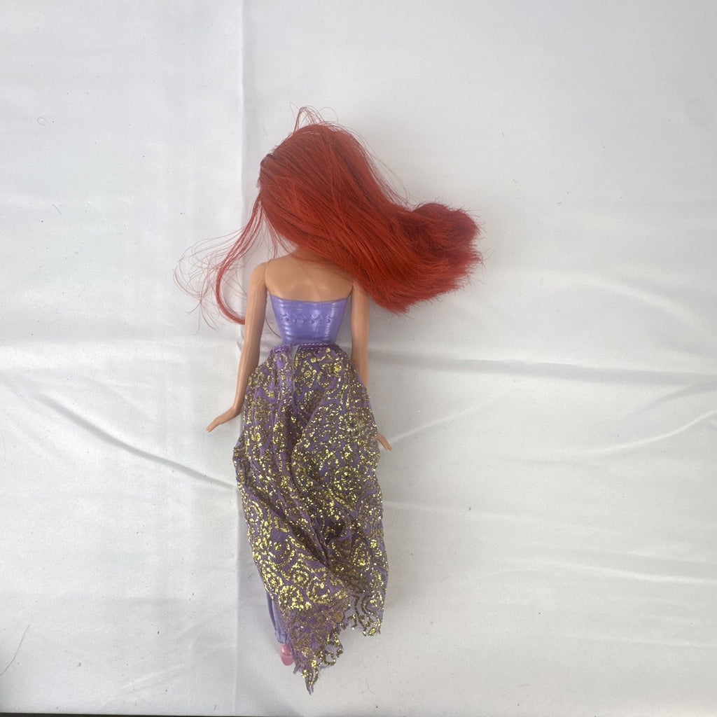 Mattel 2005 Disney Princess Ariel 11-inch fashion doll with red hair and purple glitter pants outfit