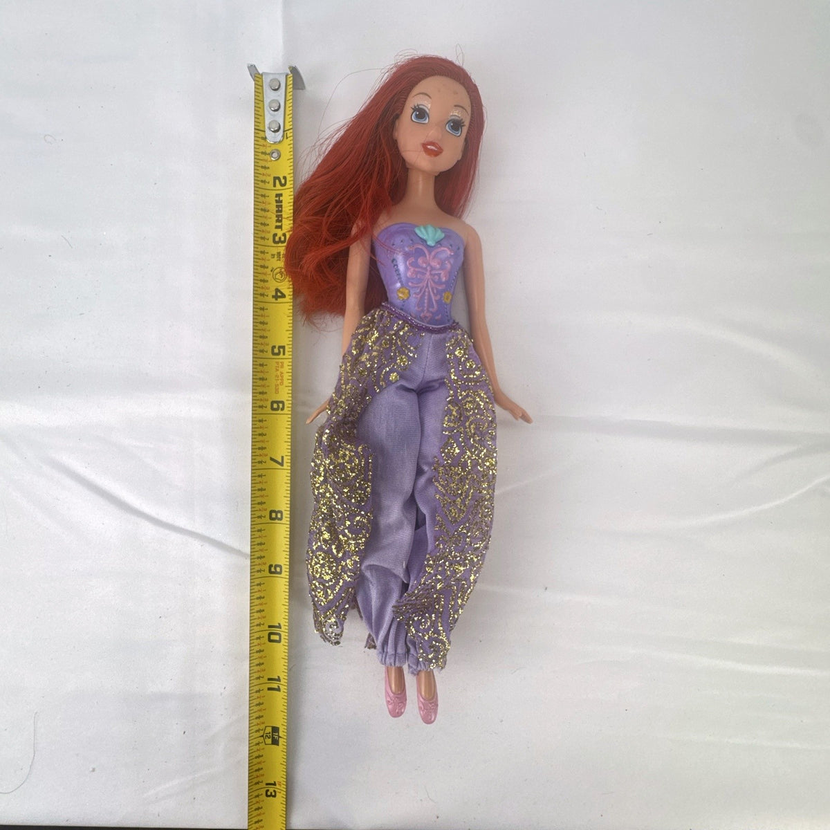 Mattel 2005 Disney Princess Ariel 11-inch fashion doll with red hair and purple glitter pants outfit