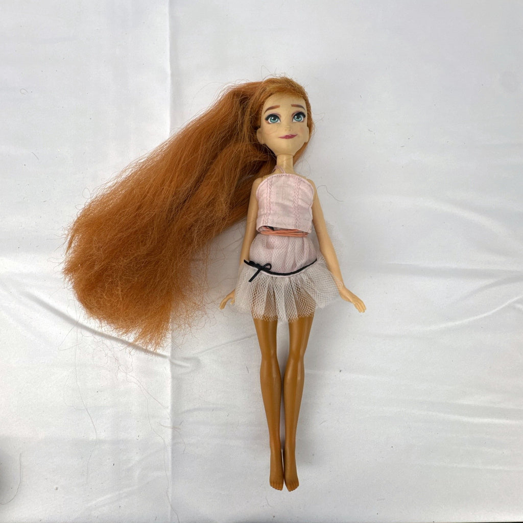 Disney Frozen 11-inch Anna fashion doll with auburn hair in a pink ballerina tutu