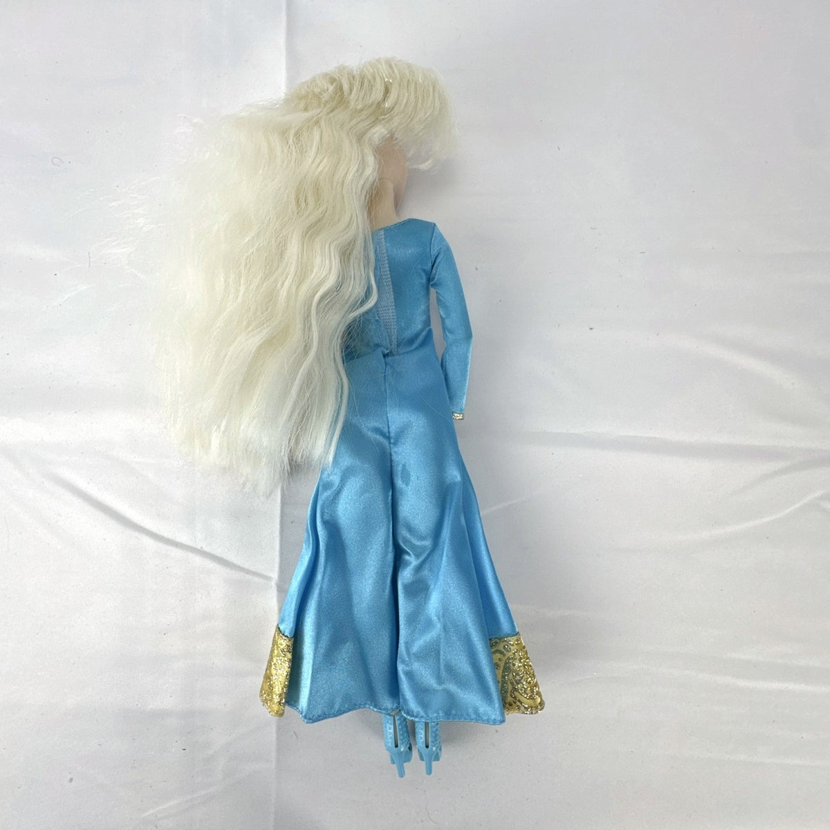 Disney Frozen Elsa 11.5-inch articulated doll wearing blue glitter gown and matching shoes