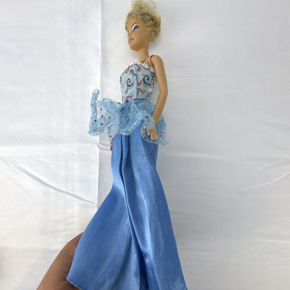 Mattel Barbie doll from 2009 in a blue princess ball gown with blonde updo
