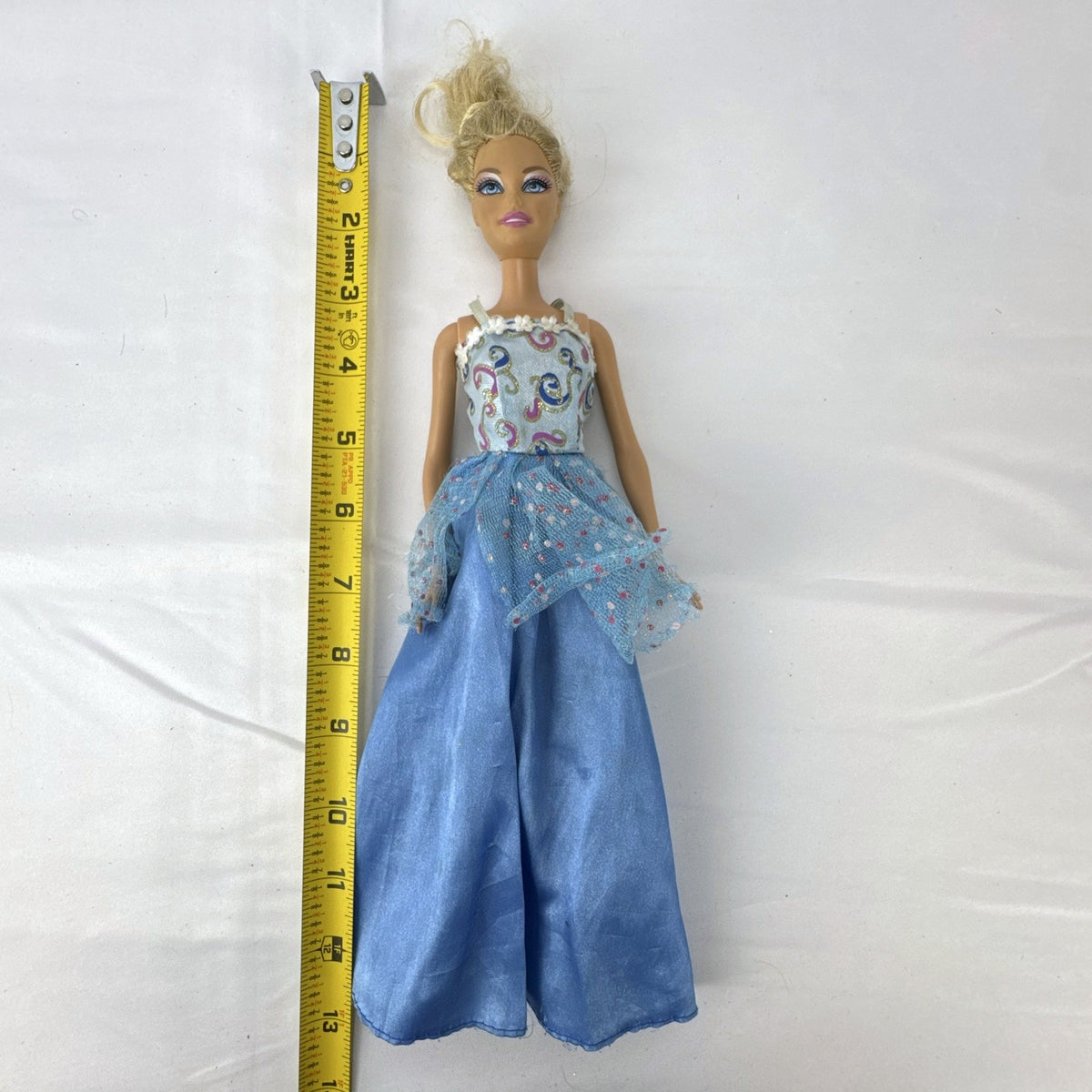 Mattel Barbie doll from 2009 in a blue princess ball gown with blonde updo