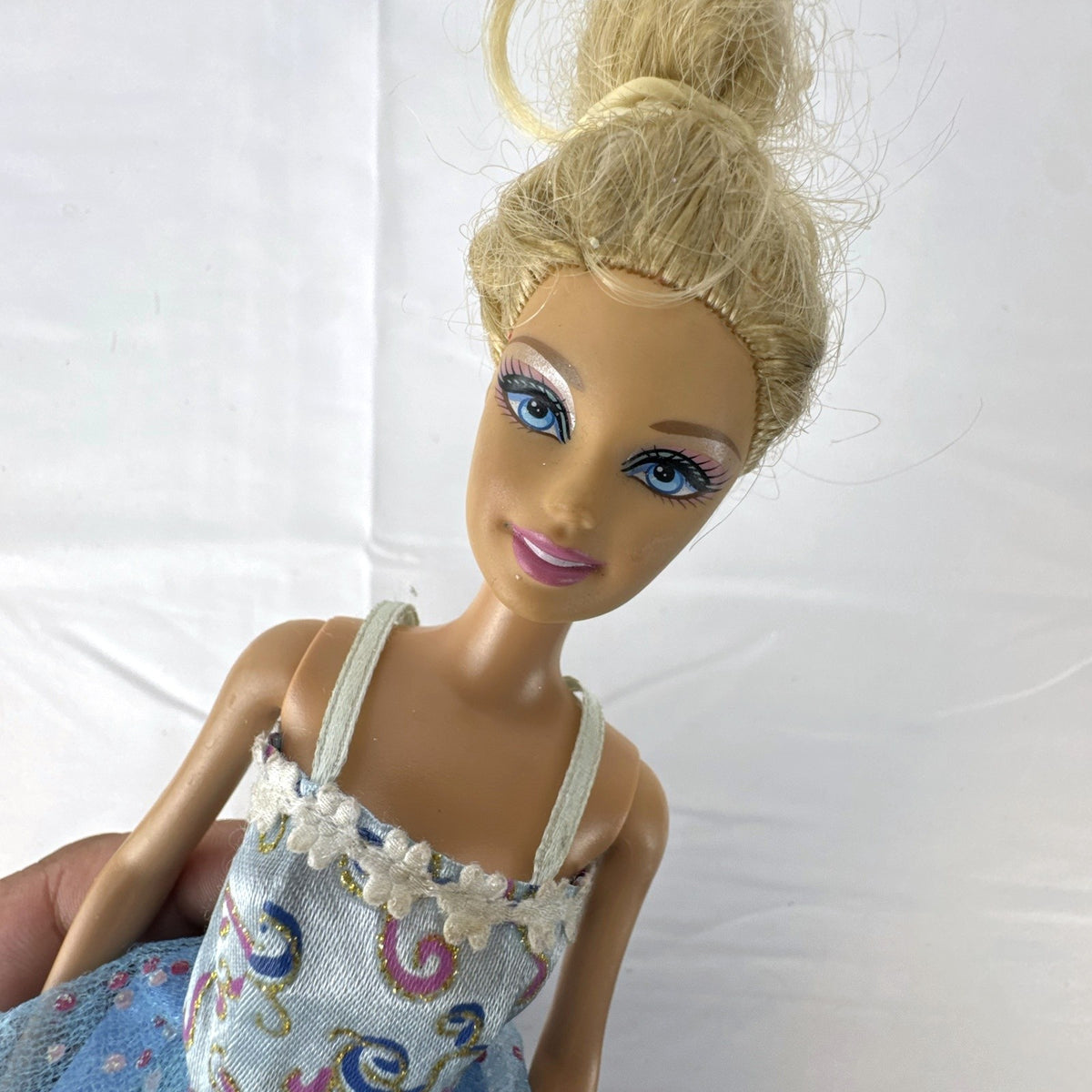 Mattel Barbie doll from 2009 in a blue princess ball gown with blonde updo
