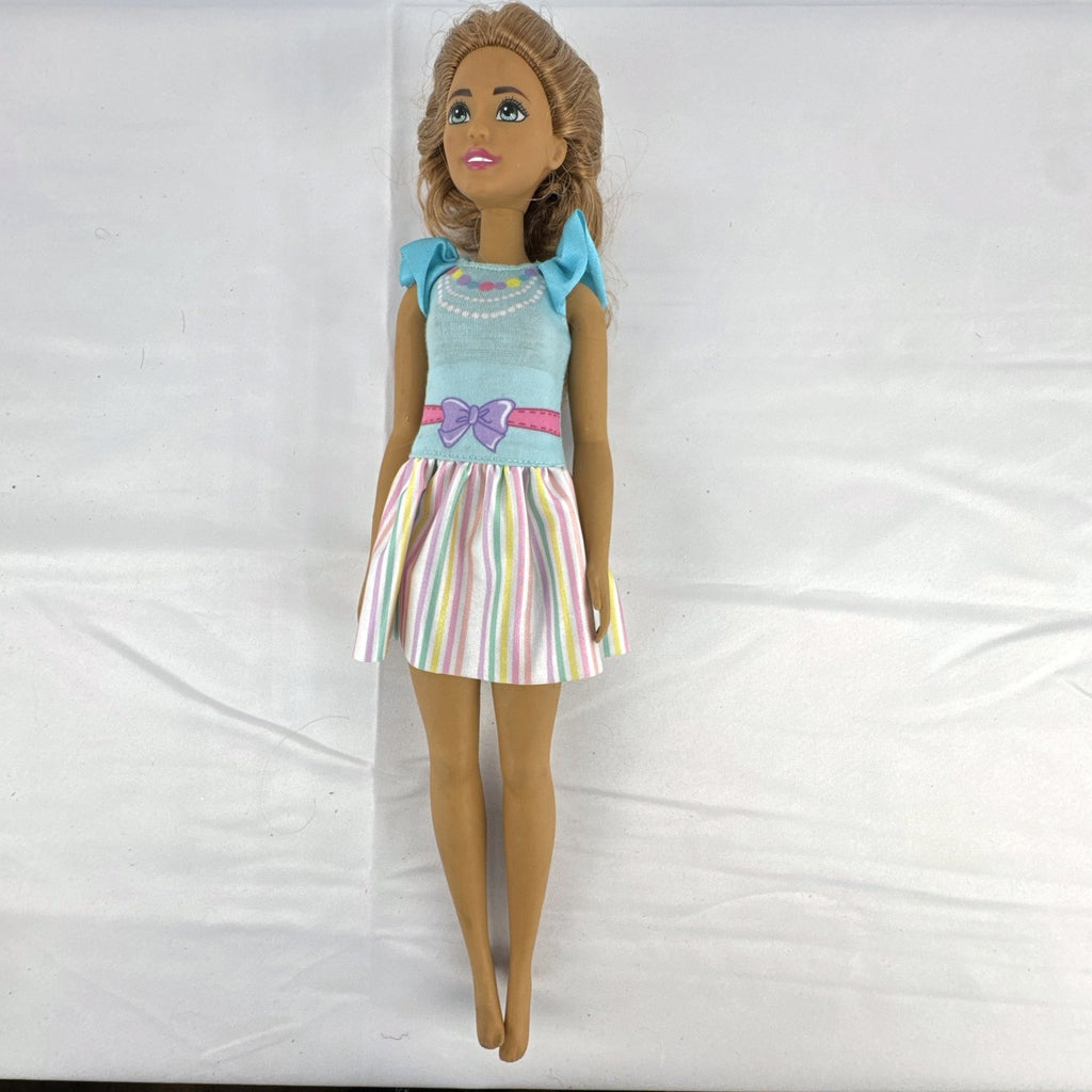 Mattel My First Barbie Teresa 14.5-inch preschool doll wearing a pastel striped ruffle dress